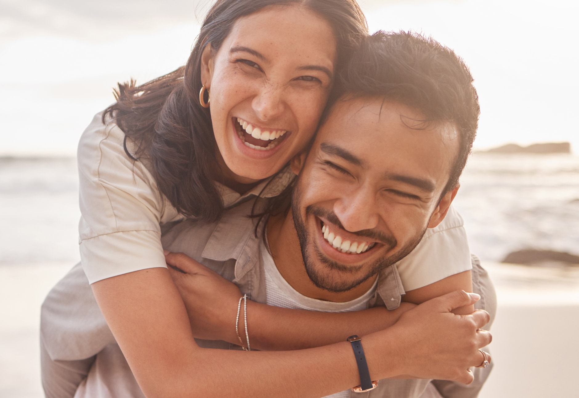 Smiling woman with great hair holding her partner