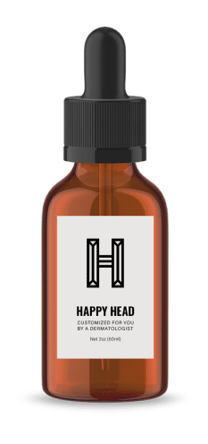 Happy Head formula bottle of topical Finasteride for hair loss and hair growth